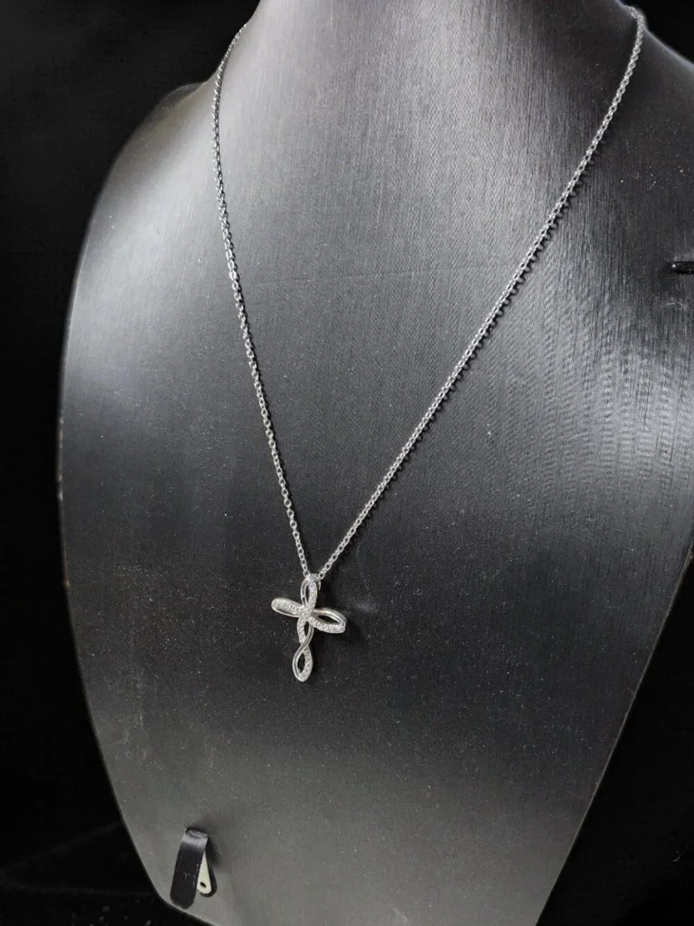 vintage Chrystal lined spiraled curled cross on a .925 sterling necklace
